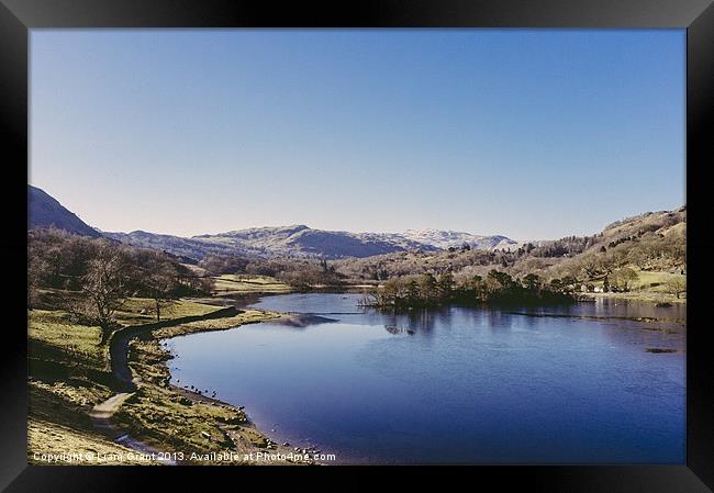 Partly frozen lake. Rydal Water. Framed Print by Liam Grant