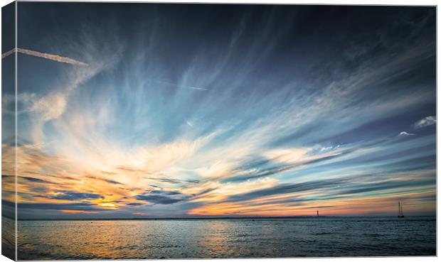 Solo Sailing into the sunset Canvas Print by Ian Johnston  LRPS