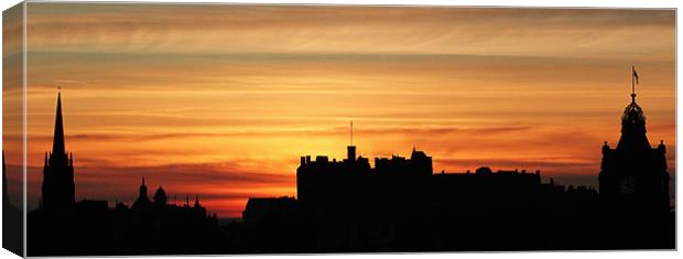 Sunset Over Edinburgh Skyline Canvas Print by Richard Thomas
