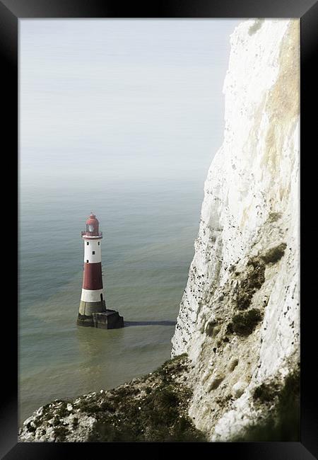 Misty lighthouse Framed Print by Richard Thomas