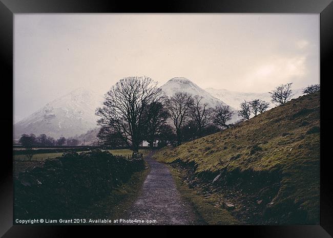 Snowing. Footpath to farmhouse. Brothers Water, La Framed Print by Liam Grant