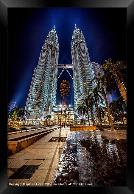 Petronas Towers Kuala Lumpur Framed Print by Adrian Evans