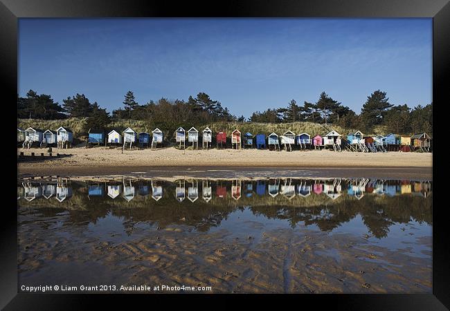 Beach huts. Wells-next-the-sea. Framed Print by Liam Grant