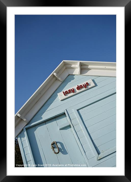 Beach hut. Wells-next-the-sea Framed Mounted Print by Liam Grant