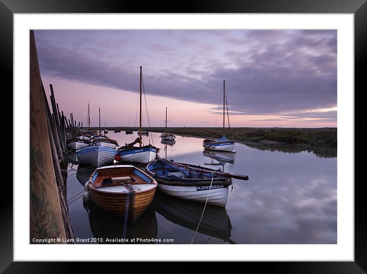 Boats at dawn, Blakeney Harbour. Framed Mounted Print by Liam Grant