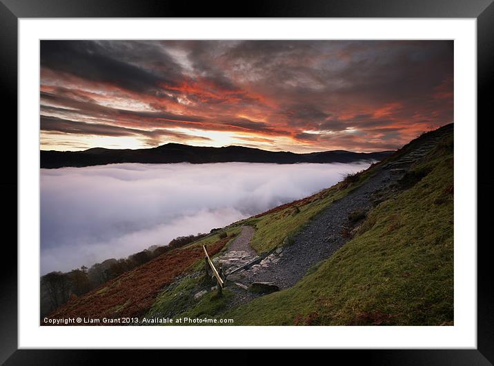 Derwent Water below cloud at sunrise. Framed Mounted Print by Liam Grant