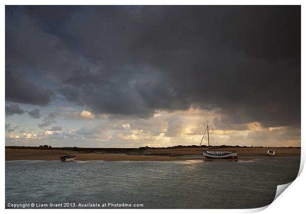 Storm over boats, Burnham Overy Staithe. Print by Liam Grant