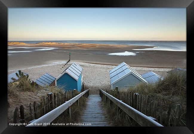 Frost covered beach huts, Wells-next-the-sea Framed Print by Liam Grant
