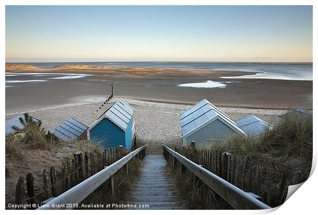 Frost covered beach huts, Wells-next-the-sea Print by Liam Grant