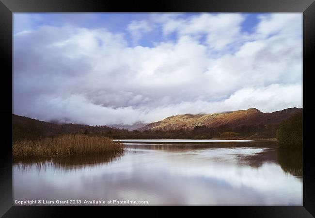 View towards the Langdales from Elter Water. Framed Print by Liam Grant