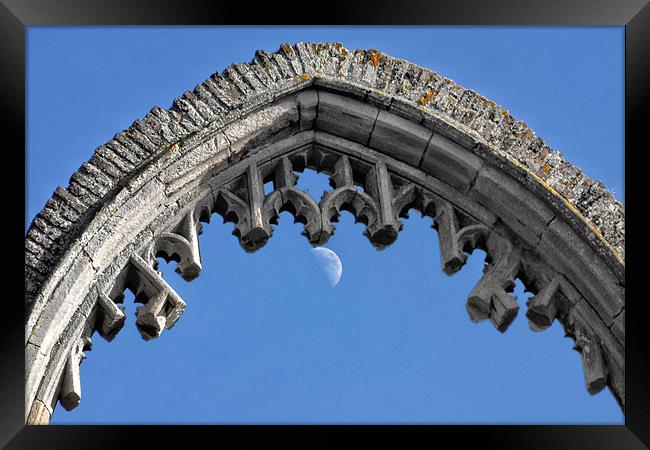 Moon hanging on the archway Framed Print by Gary Pearson