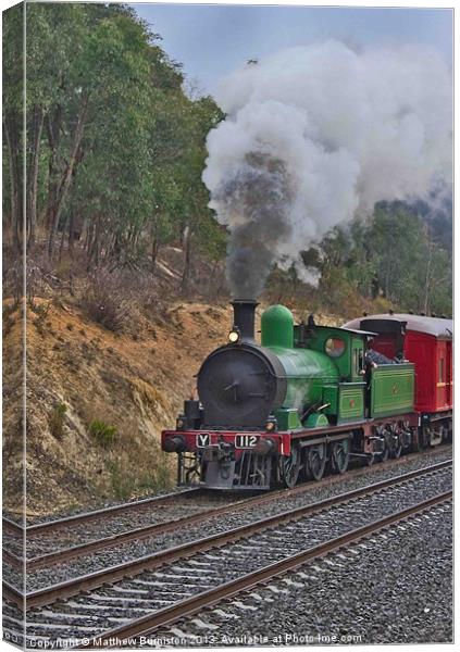 Steamtrain Y 112 steams up the hill Canvas Print by Matthew Burniston