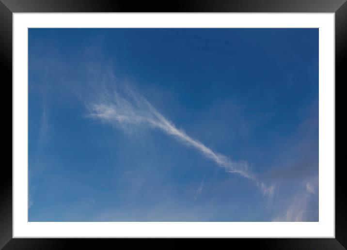 Blue sky with a twist Framed Mounted Print by David Pyatt