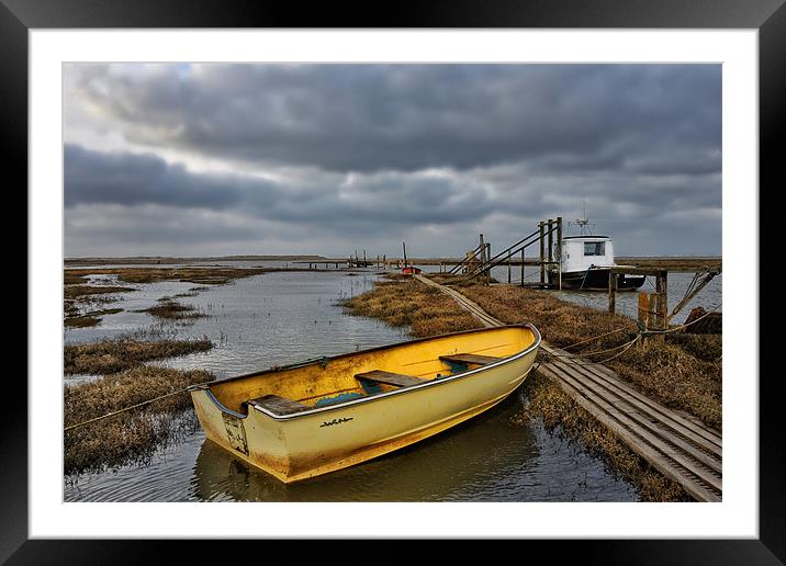 Yellow rowing boat Thornham quay Framed Mounted Print by Gary Pearson