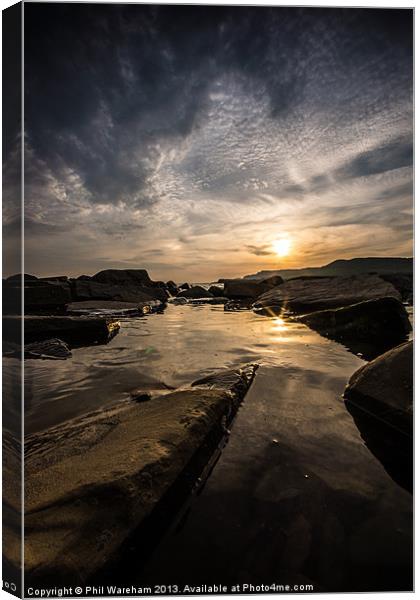 Sunset over a rock pool Canvas Print by Phil Wareham