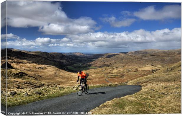 Pedalling the Pass Canvas Print by Rob Hawkins
