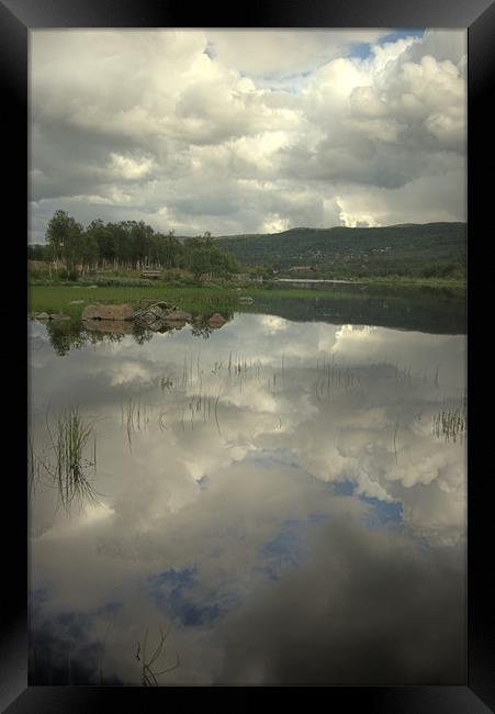 Reflecting on a lake  Framed Print by Alan Pickersgill