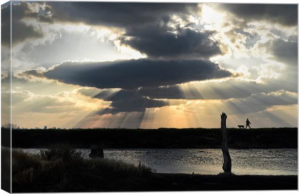 Walking under the god rays Canvas Print by Gary Pearson