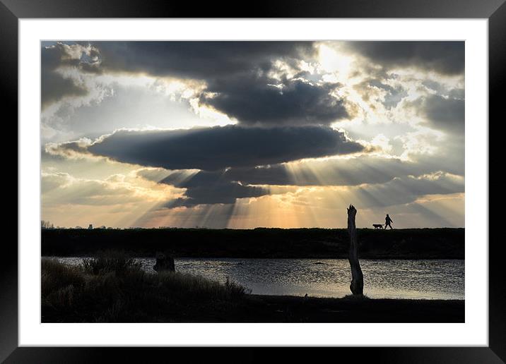Walking under the god rays Framed Mounted Print by Gary Pearson