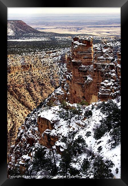 Snowy ledges Framed Print by Lee Mullins