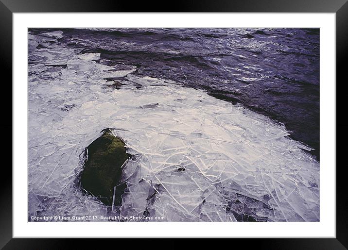 Broken ice on the shore of Grasmere. Framed Mounted Print by Liam Grant