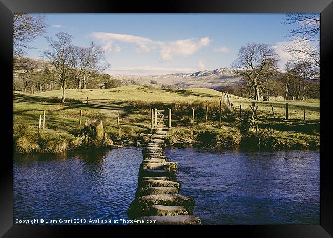 Stepping stones over the River Rothay near Amblesi Framed Print by Liam Grant