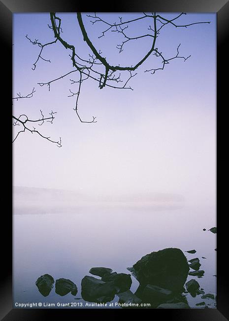 Dawn mist and reflections. Windermere. Framed Print by Liam Grant