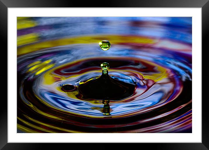 Bouncing droplets of colour Framed Mounted Print by Andrew Lee