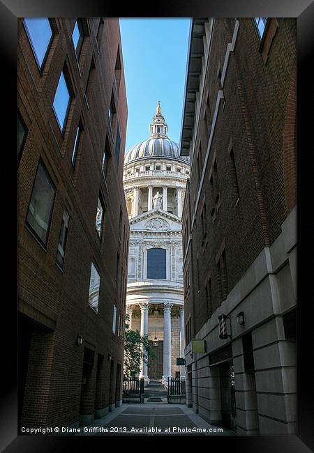 St Pauls Cathedral through an alley Framed Print by Diane Griffiths