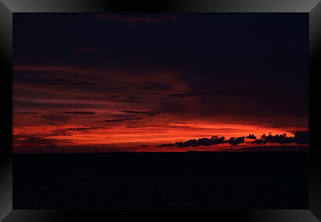 Maldivian Red Sunset Framed Print by Jon Bryant