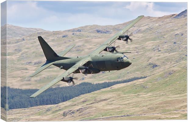 Hercules low flying in Wales Canvas Print by Rory Trappe