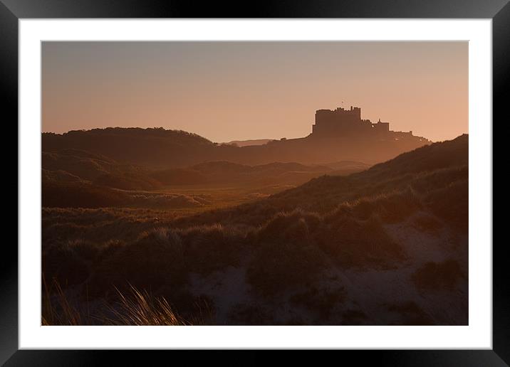Bamburgh Castle in the Haze Framed Mounted Print by Neil Coleran