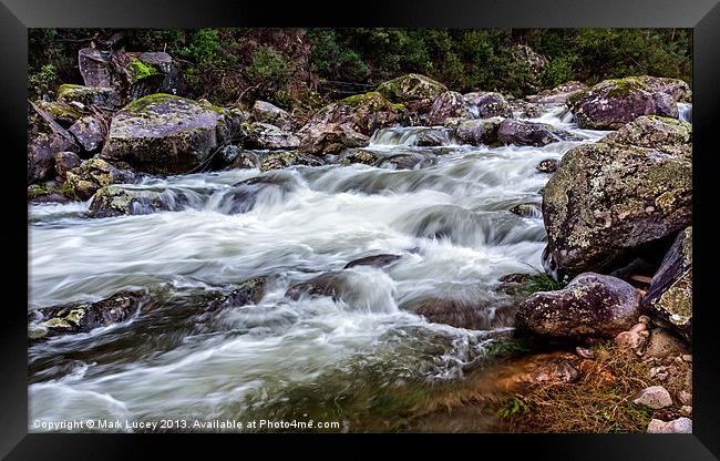 Trickle to a Torrent Framed Print by Mark Lucey