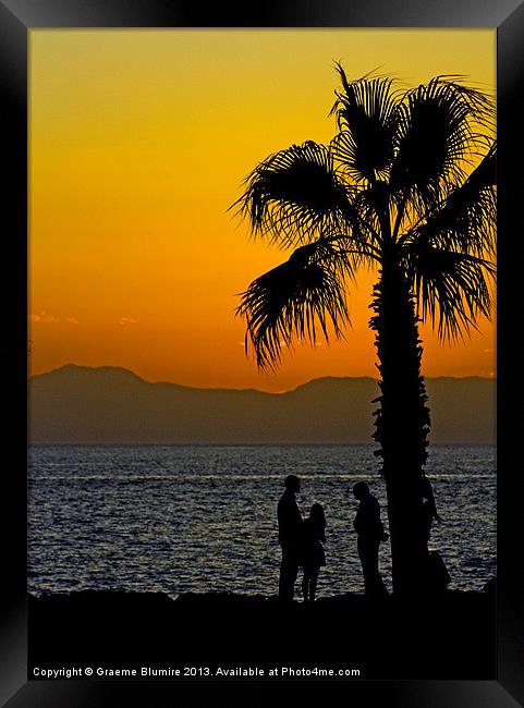 Sunset Discussion Framed Print by Graeme B