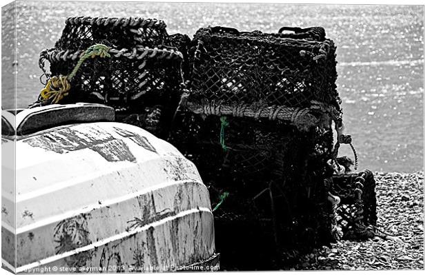 lobster pots on the shore Canvas Print by steve akerman