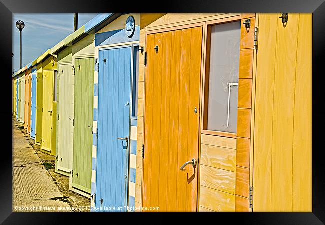 Colourful beach huts at Seaford Framed Print by steve akerman