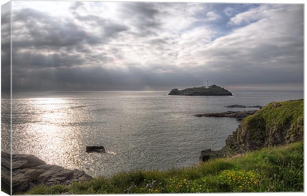 Sunlight at Godrevy Lighthouse Canvas Print by Jonathan OConnell