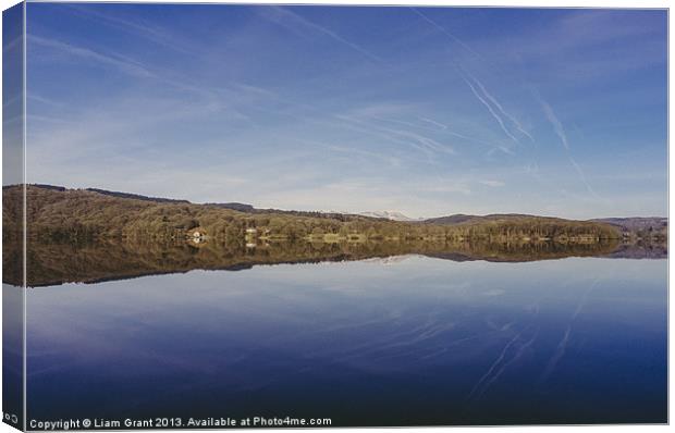 Mirror reflections at sunrise. Windermere, Lake Di Canvas Print by Liam Grant