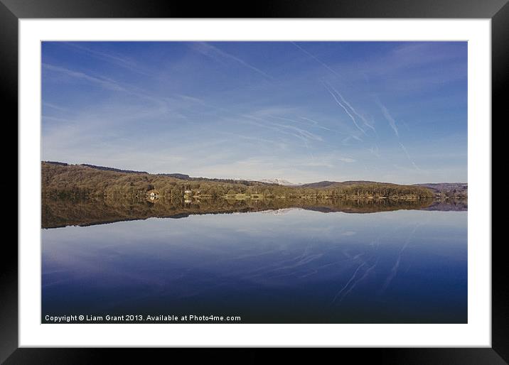 Mirror reflections at sunrise. Windermere, Lake Di Framed Mounted Print by Liam Grant
