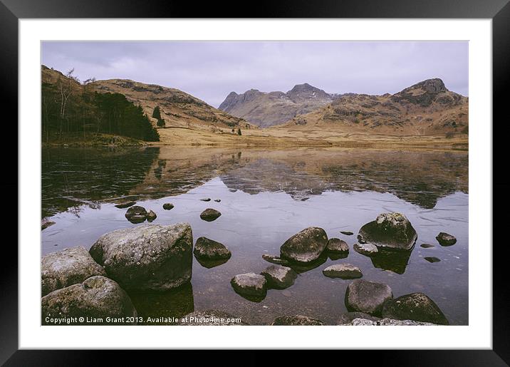 Frozen Blea Tarn and Langdale Pikes. Lake District Framed Mounted Print by Liam Grant