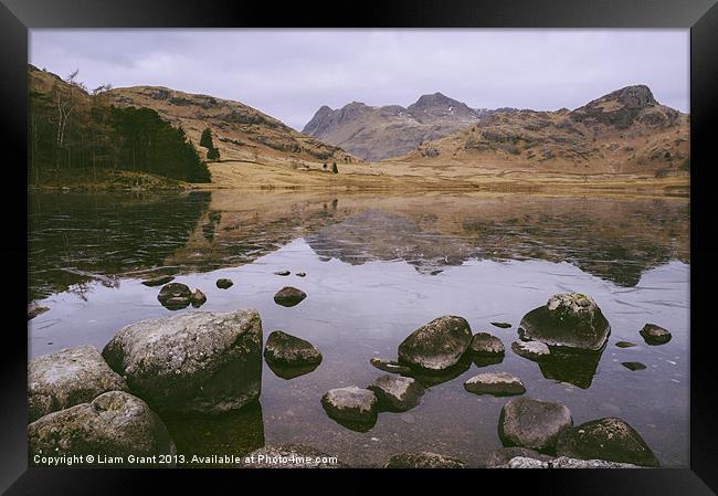 Frozen Blea Tarn and Langdale Pikes. Lake District Framed Print by Liam Grant
