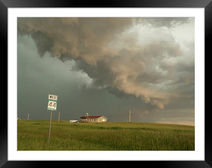 Storm clouds above house Framed Mounted Print by mark humpage