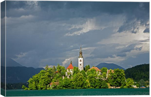 Storm light over Lake Bled Canvas Print by Ian Middleton