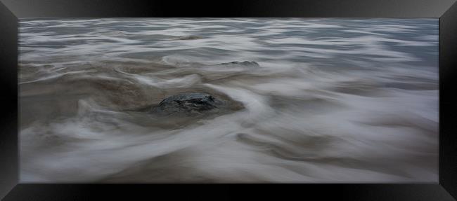 Ebb tide flow Framed Print by Ian Jones