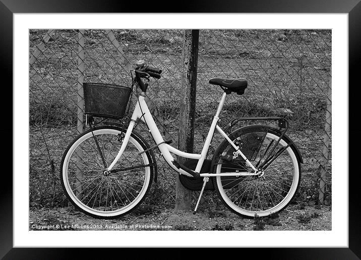 The white bike Framed Mounted Print by Lee Mullins