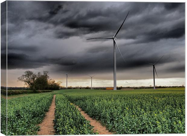 Wind Turbines with clouds Canvas Print by mark humpage