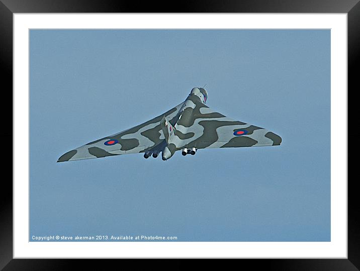 Vulcan bomber climbing into the sky Framed Mounted Print by steve akerman
