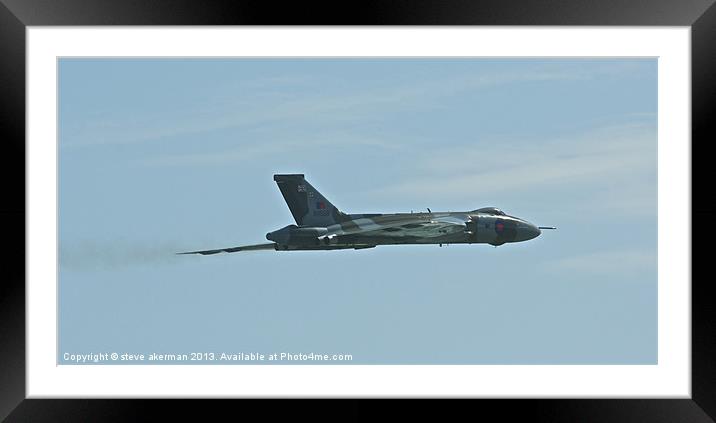 Vulcan bomber flying past Hastings Framed Mounted Print by steve akerman