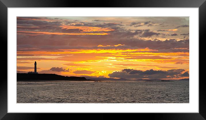 Late evening sunset at Lossiemouth lighthouse Framed Mounted Print by Lloyd Fudge