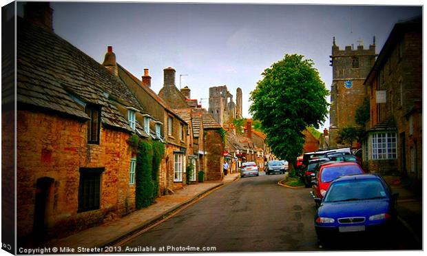 Corfe Castle Village Canvas Print by Mike Streeter